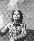 [kid juggling scarves photo]